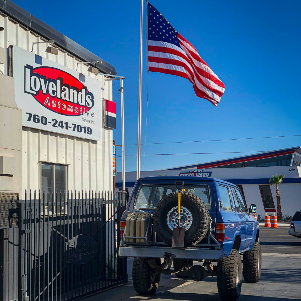 Toyota Land Cruiser exiting shop